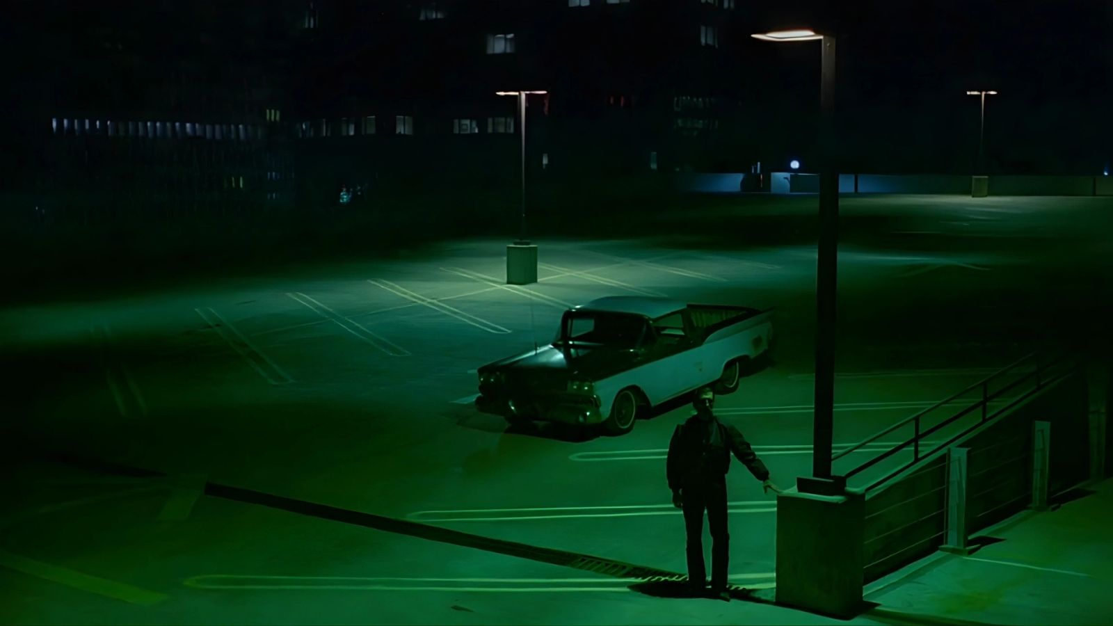 Travis taking a final look at Jane and Hunter from the parking lot.