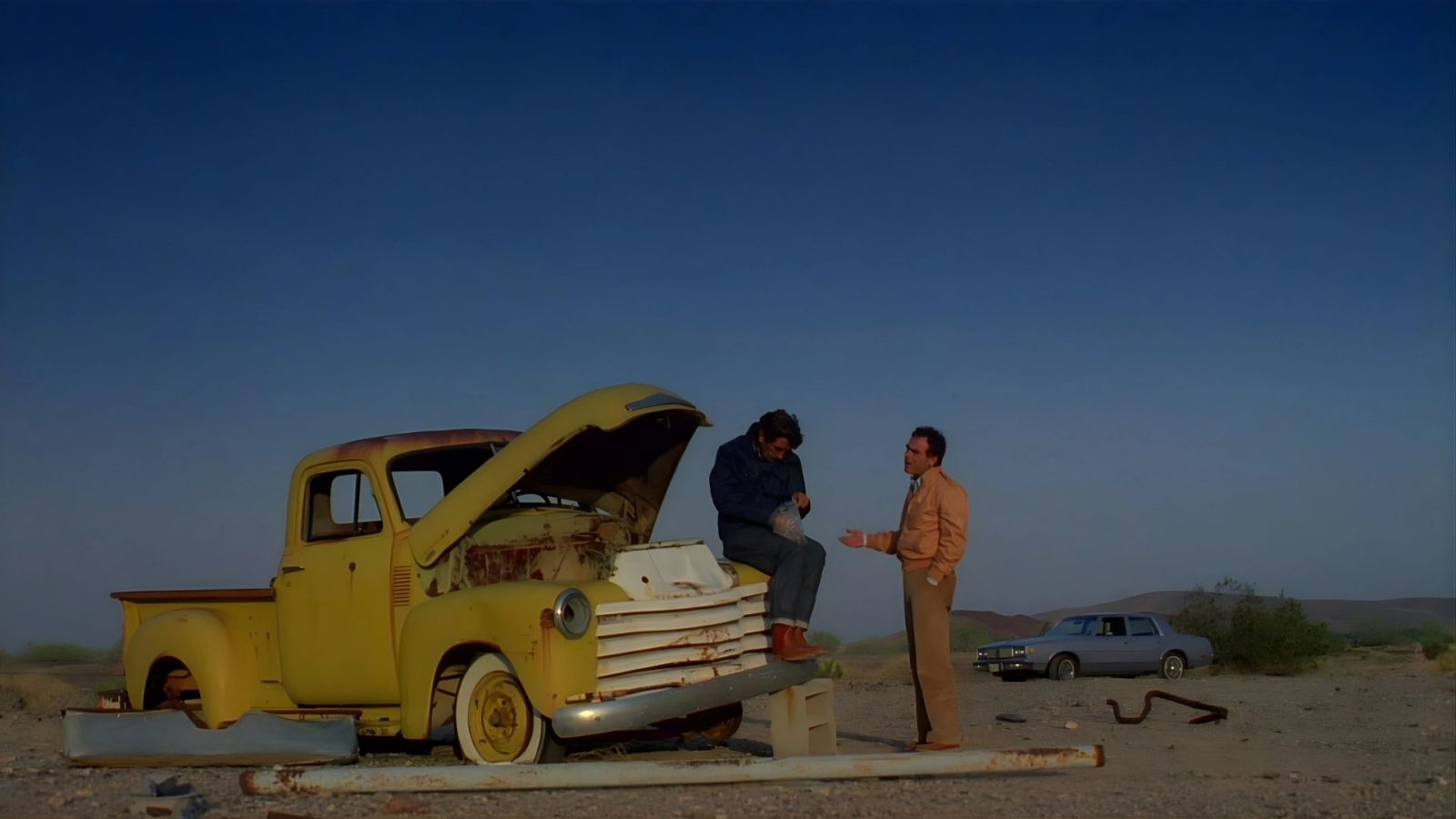 Walt trying to talk to Travis on the side of the highway.